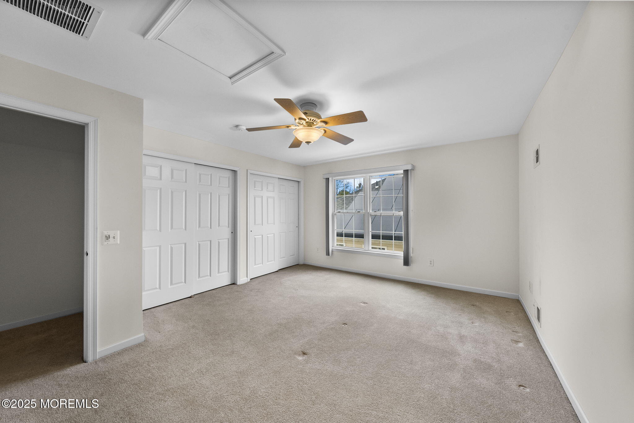 14 Barton Creek Road Jackson, NJ 08527 - Photo 43 of 69 an empty room with ceiling fan and window