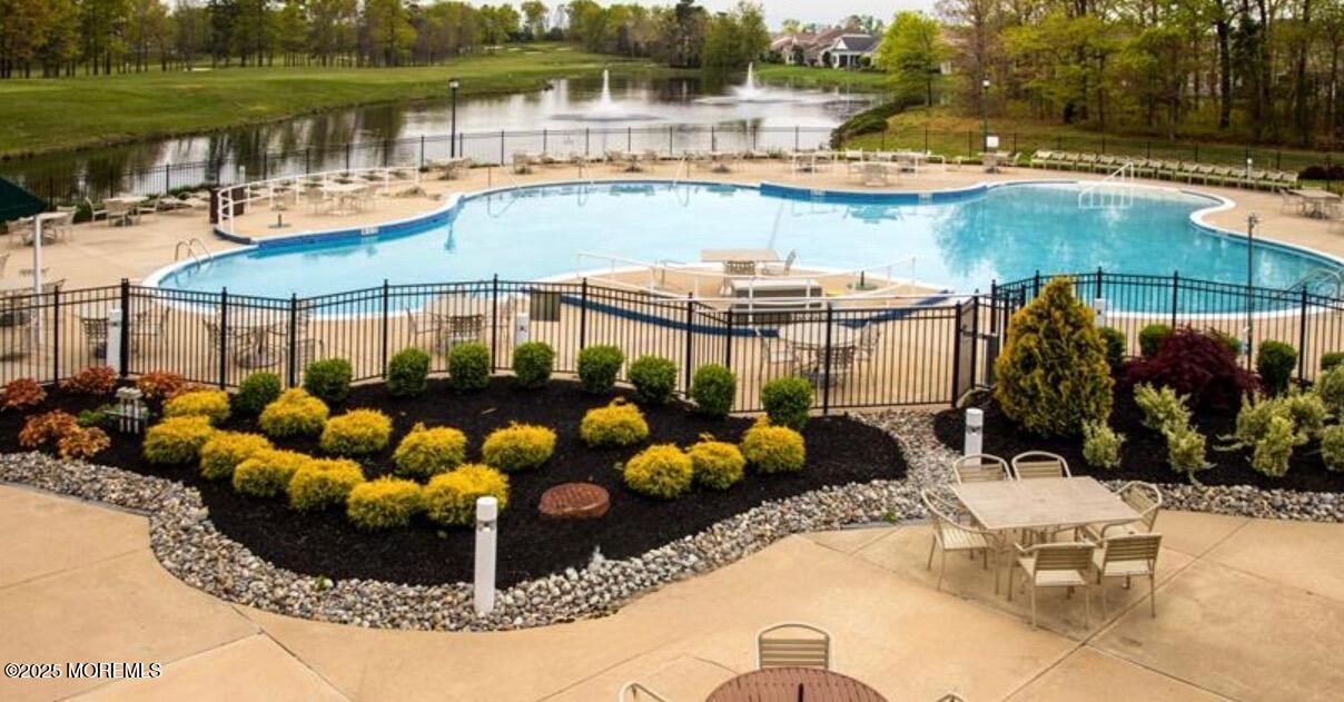 14 Barton Creek Road Jackson, NJ 08527 - Photo 62 of 69 a view of a swimming pool with a patio and plants