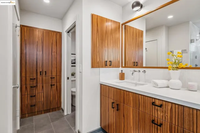 a bathroom with a shower and a sink