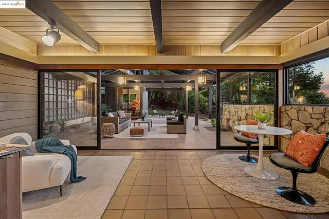 a outdoor living space with furniture and window