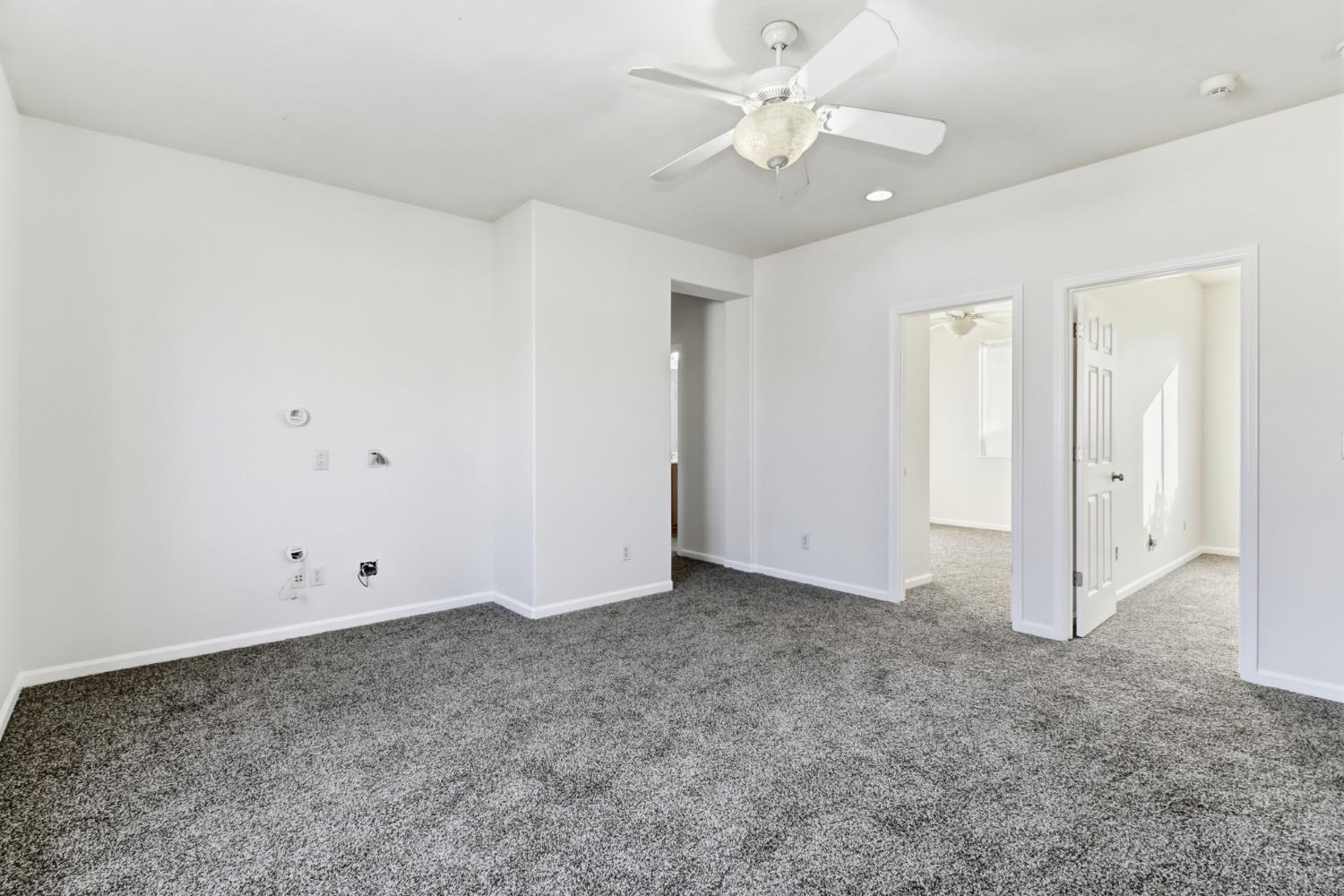 11832 Stoney Ridge Way Rancho Cordova, CA 95742 - Photo 19 of 44 an empty room with fan