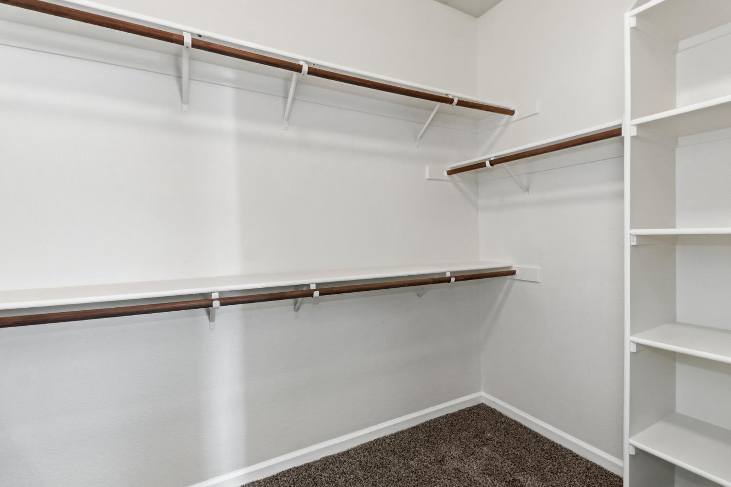 11832 Stoney Ridge Way Rancho Cordova, CA 95742 - Photo 27 of 44 a view of a room with racks on the wall