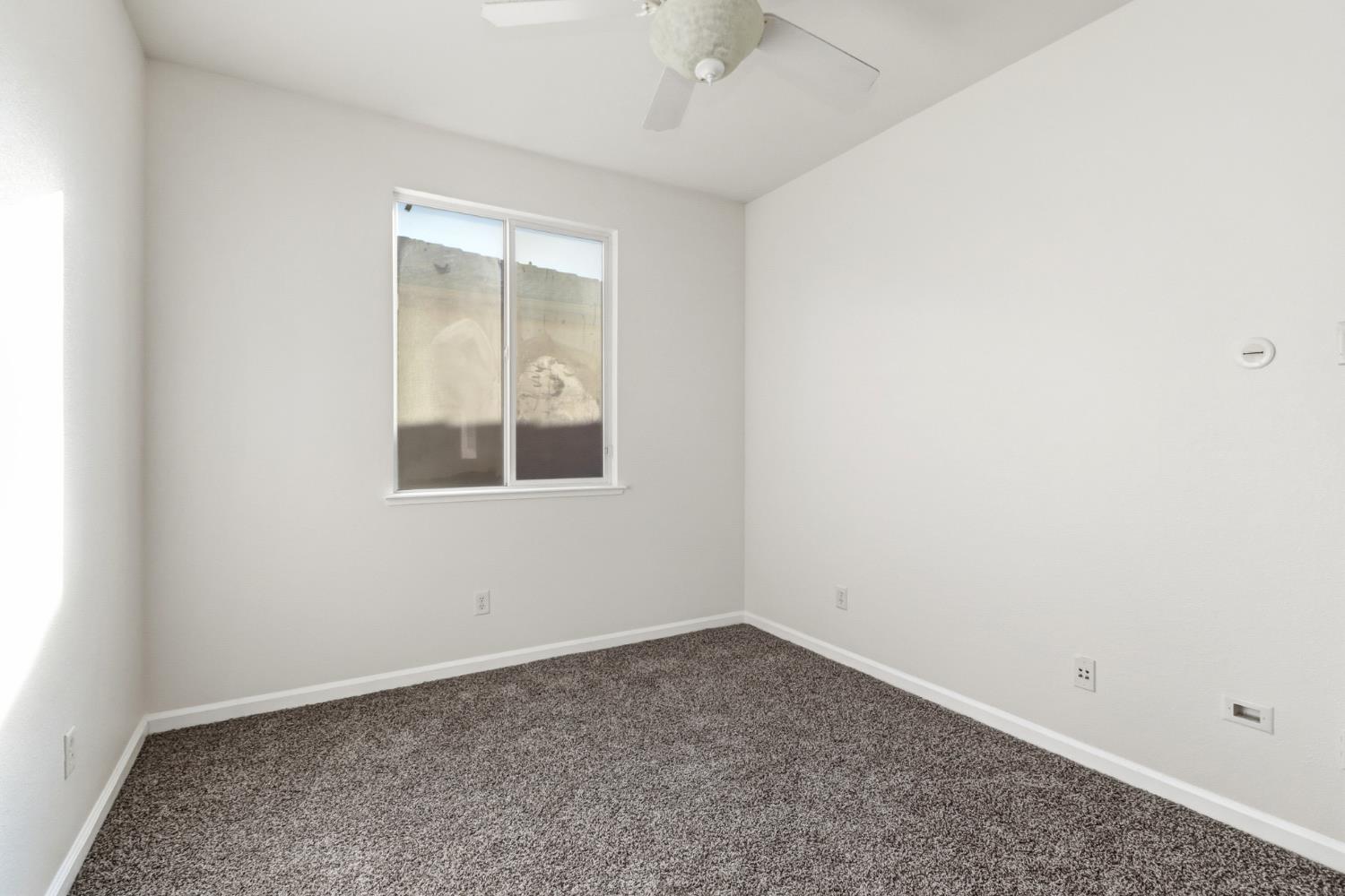 11832 Stoney Ridge Way Rancho Cordova, CA 95742 - Photo 28 of 44 an empty room with a window