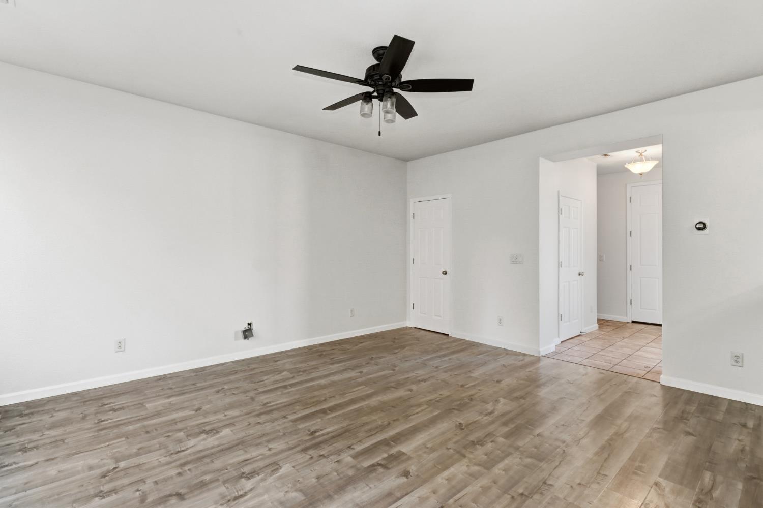 11832 Stoney Ridge Way Rancho Cordova, CA 95742 - Photo 3 of 44 wooden floor in an empty room