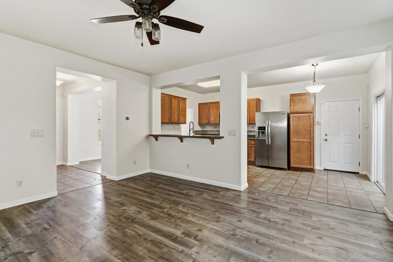 11832 Stoney Ridge Way Rancho Cordova, CA 95742 - Photo 5 of 44 a view of a kitchen with a sink and cabinet area