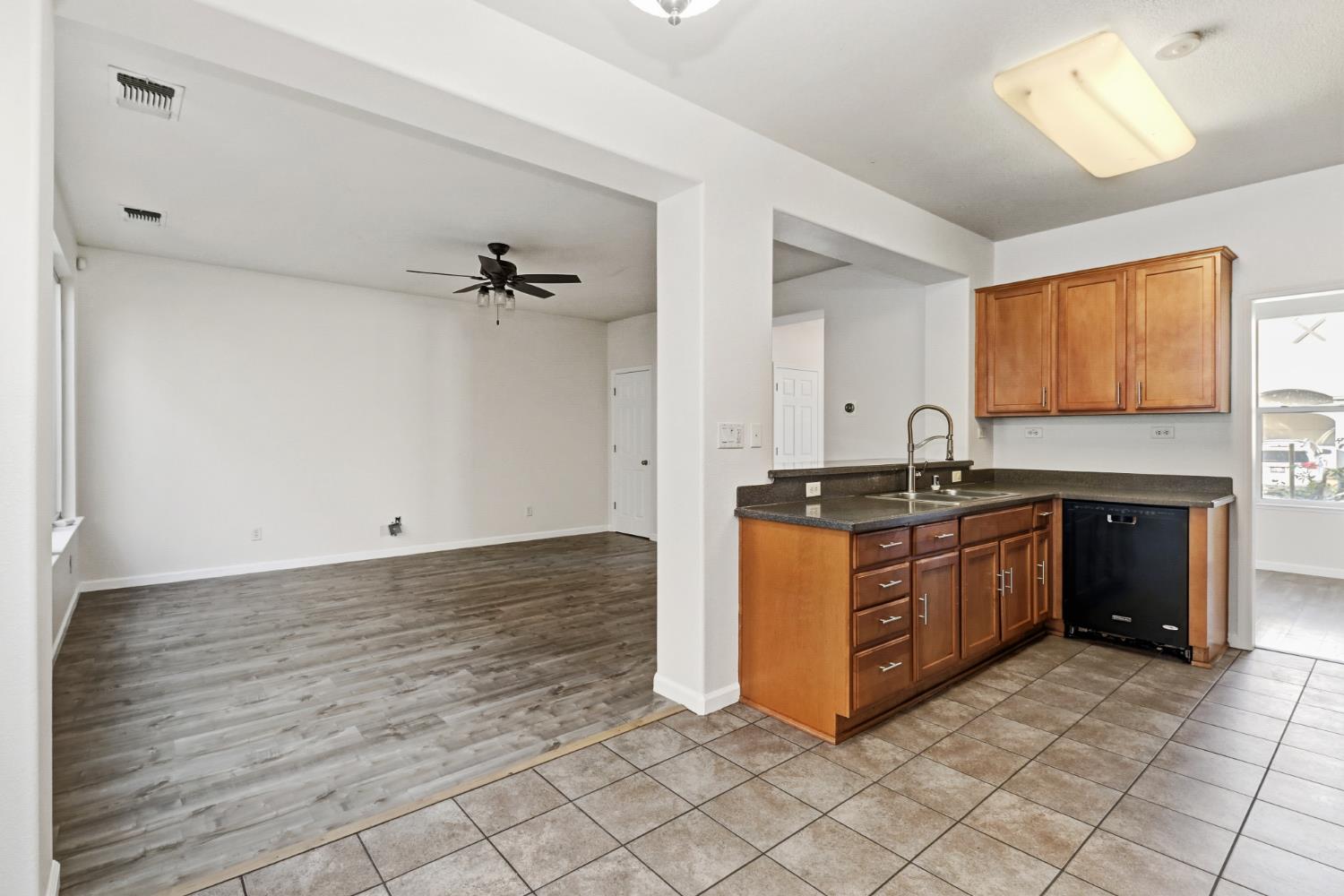 11832 Stoney Ridge Way Rancho Cordova, CA 95742 - Photo 8 of 44 a kitchen with stainless steel appliances granite countertop a sink and cabinets