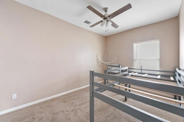 a view of a bathroom with a sink and a mirror