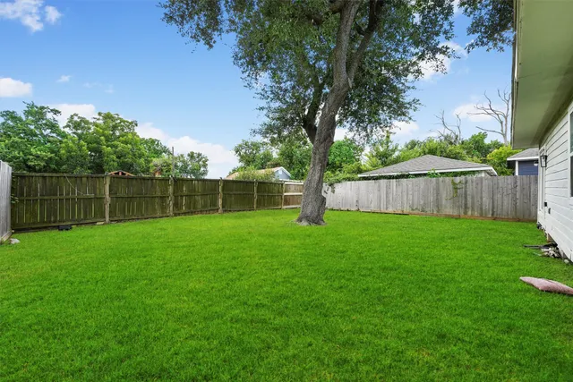 a view of a backyard with a garden