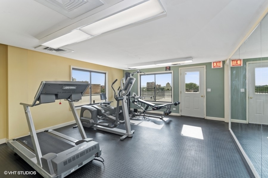 6102 North Sheridan Road, Unit 410 Chicago, IL 60660 - Photo 8 of 12 a view of a room with gym equipment