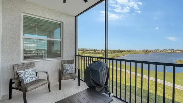 a kitchen with stainless steel appliances a stove sink microwave and cabinets