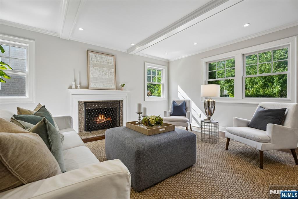 11 Mt Vernon Road Montclair, NJ 07043 - Photo 4 of 49 a living room with furniture and a fireplace
