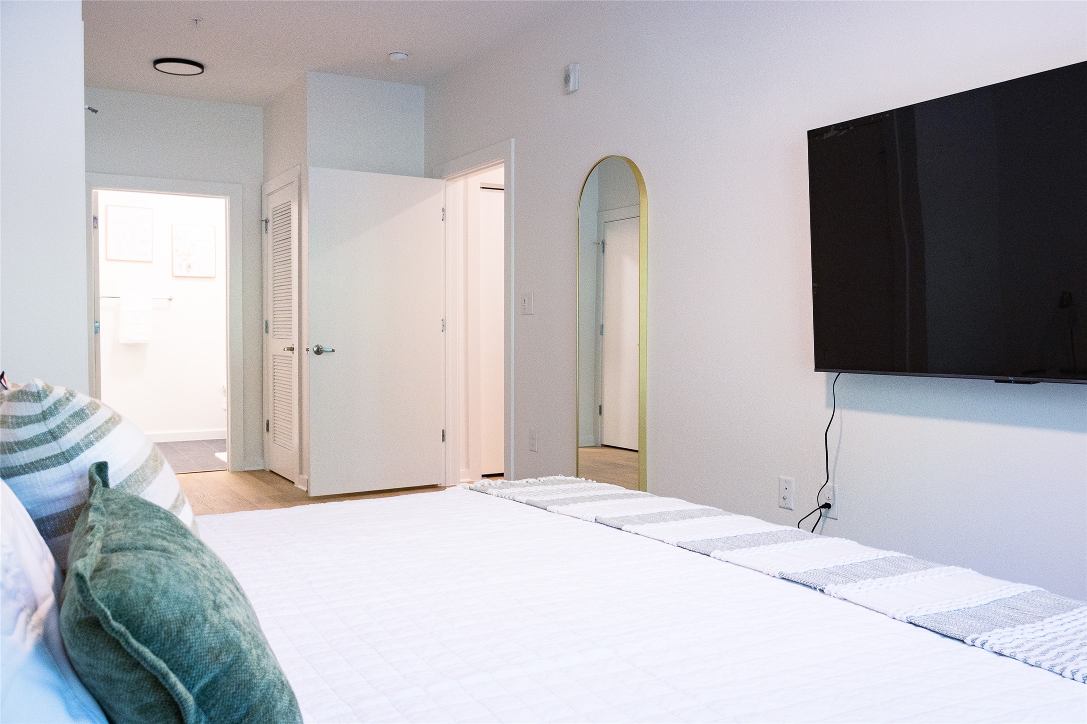 2505 Thornton Road, Unit 3108 Austin, TX 78704 - Photo 19 of 32 a bedroom with a bed and a cabinets