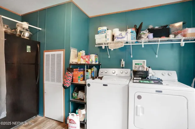 a view of a field with an ocean