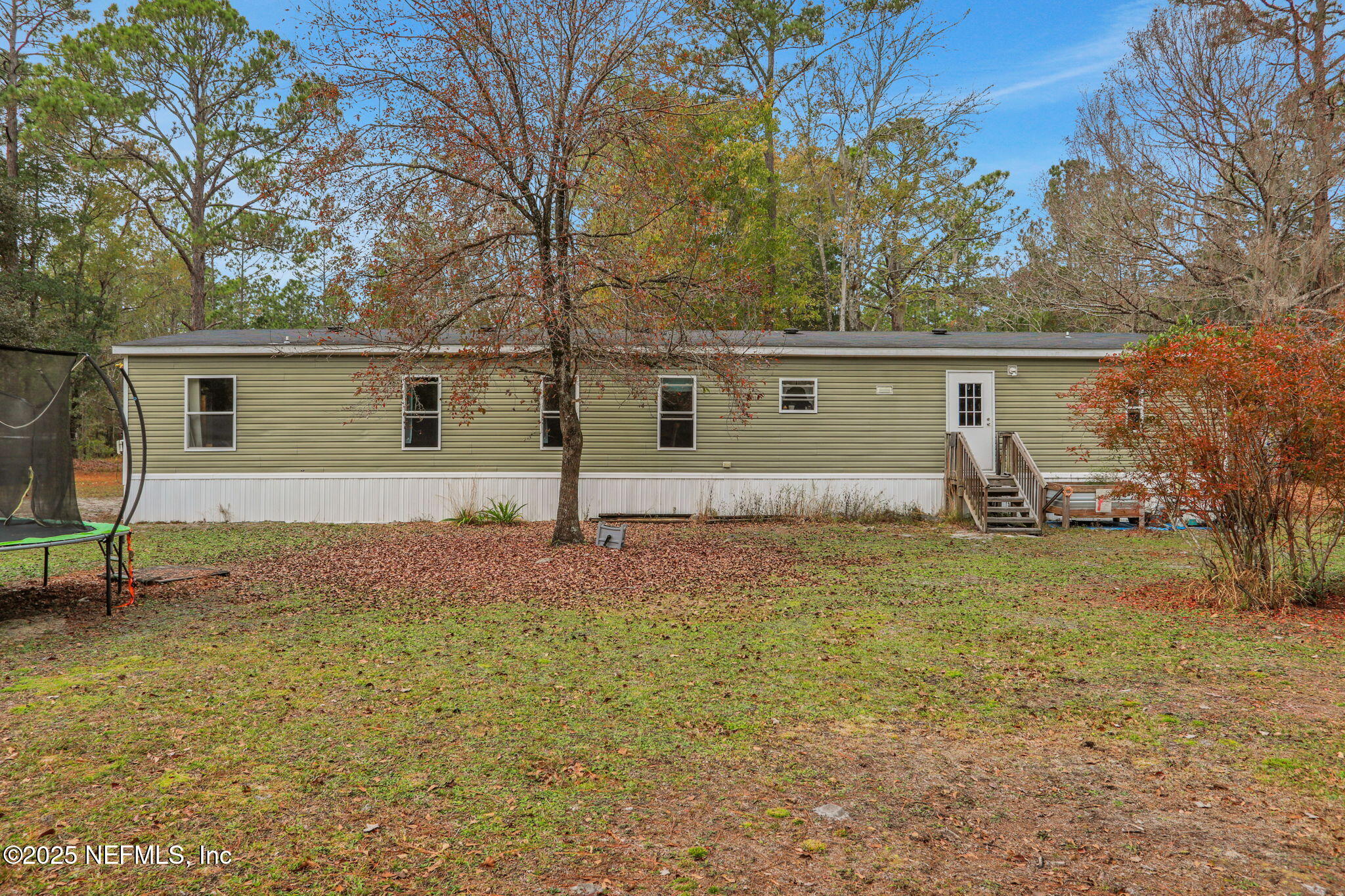 4527 Bondarenko Road Keystone Heights, FL 32656 - Photo 35 of 56 front view of house with a yard
