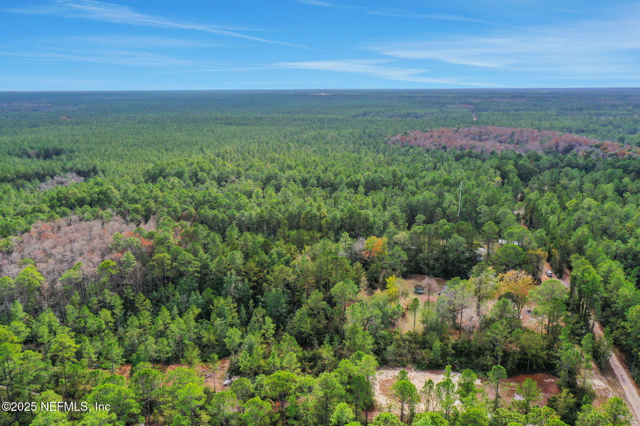 4527 Bondarenko Road Keystone Heights, FL 32656 - Photo 37 of 56 a view of a city with lush green forest