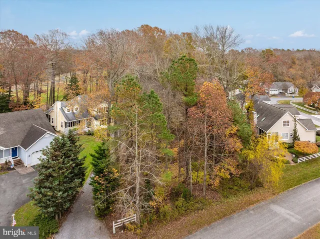 an aerial view of residential building and parking space