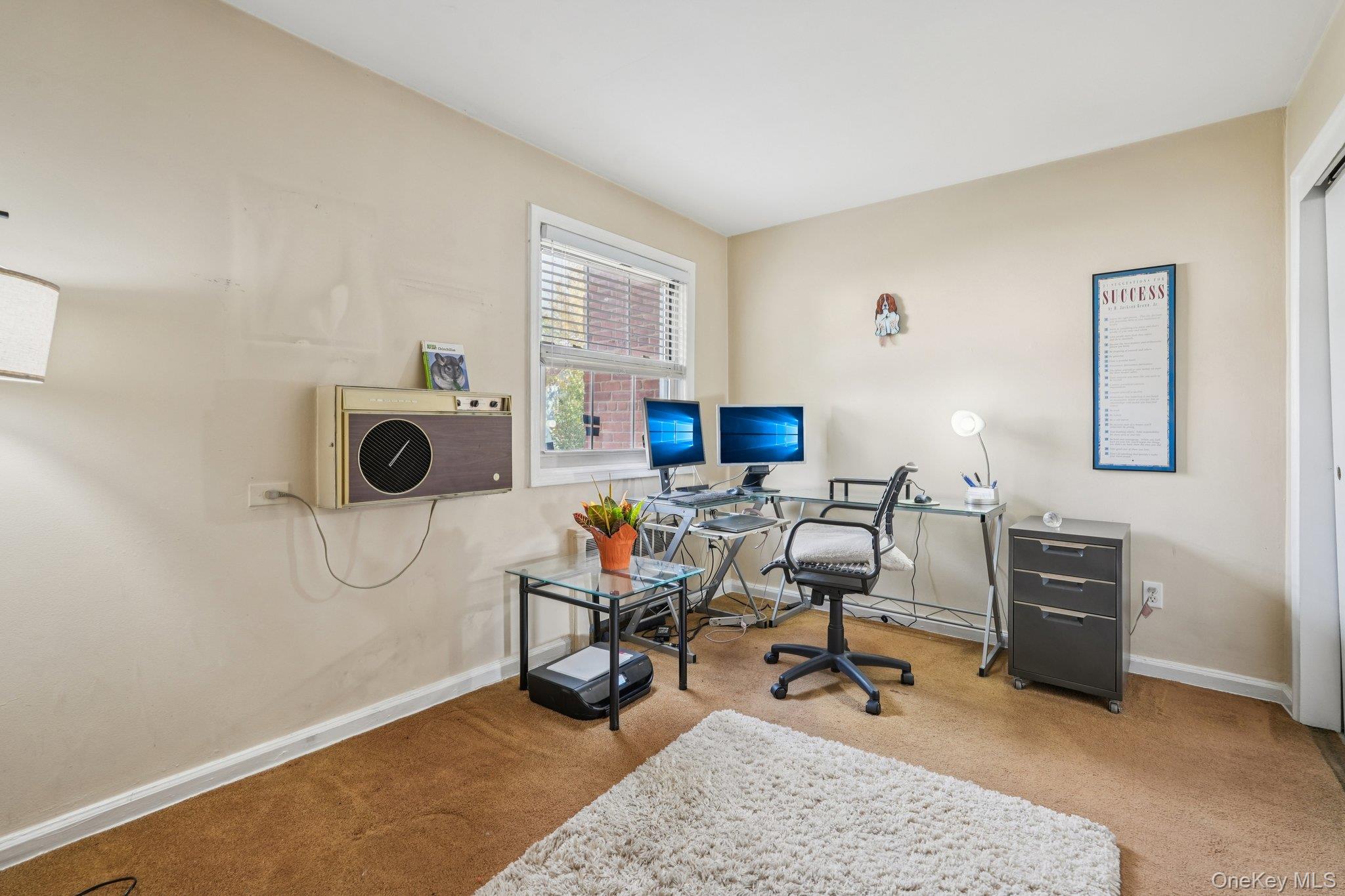 57 Maple Avenue, Unit 2B Hastings-on-Hudson, NY 10706 - Photo 27 of 38 a view of a workspace with furniture and a window