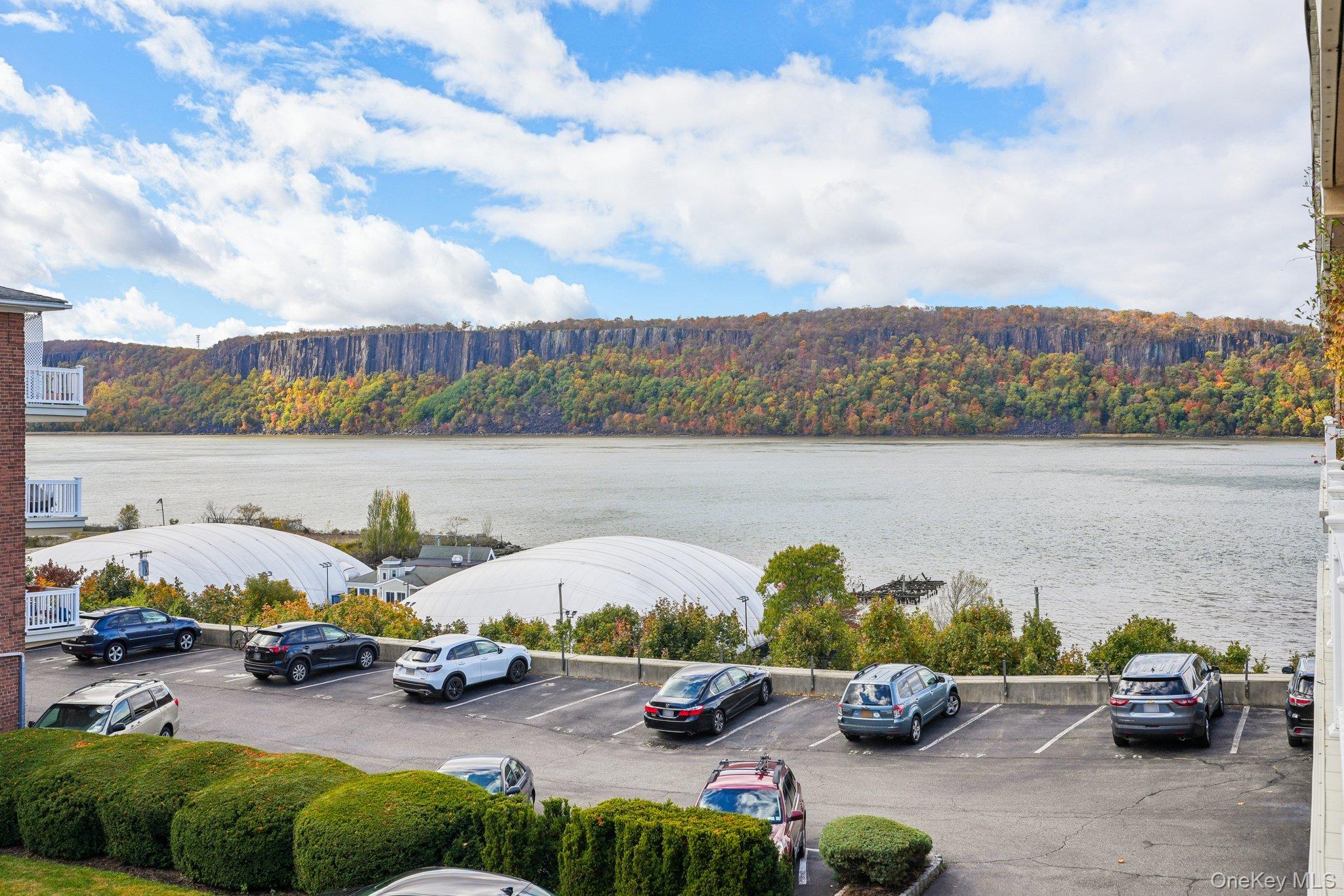 57 Maple Avenue, Unit 2B Hastings-on-Hudson, NY 10706 - Photo 32 of 38 a view of lake with lawn chairs
