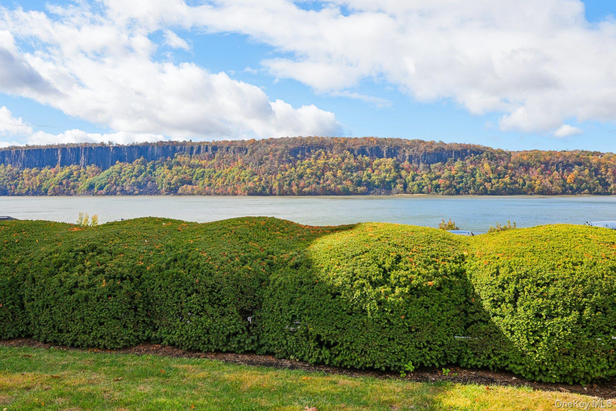 57 Maple Avenue, Unit 2B Hastings-on-Hudson, NY 10706 - Photo 36 of 38 a view of a lake with a big yard
