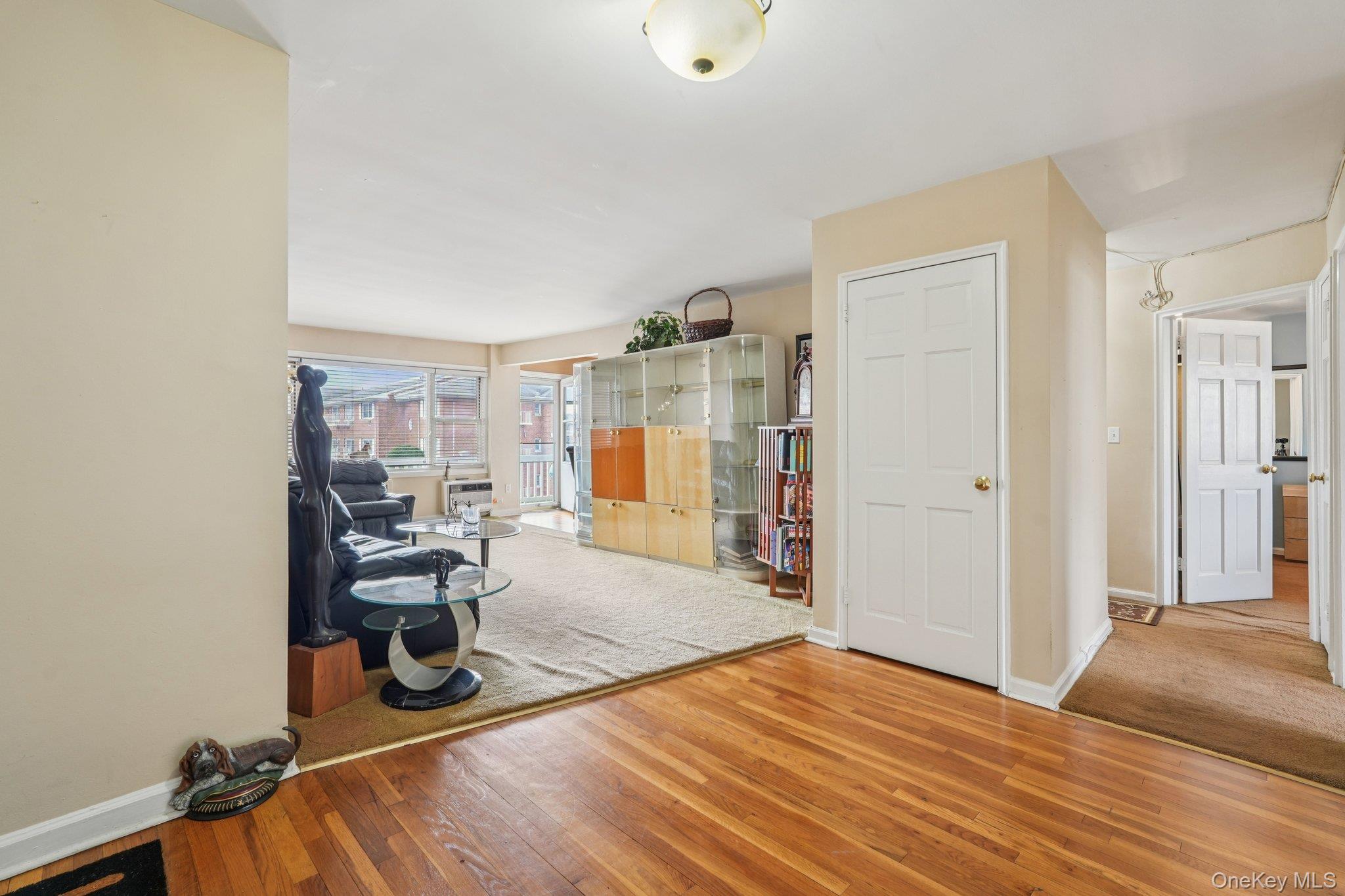57 Maple Avenue, Unit 2B Hastings-on-Hudson, NY 10706 - Photo 7 of 38 a bedroom with furniture and a wooden floor