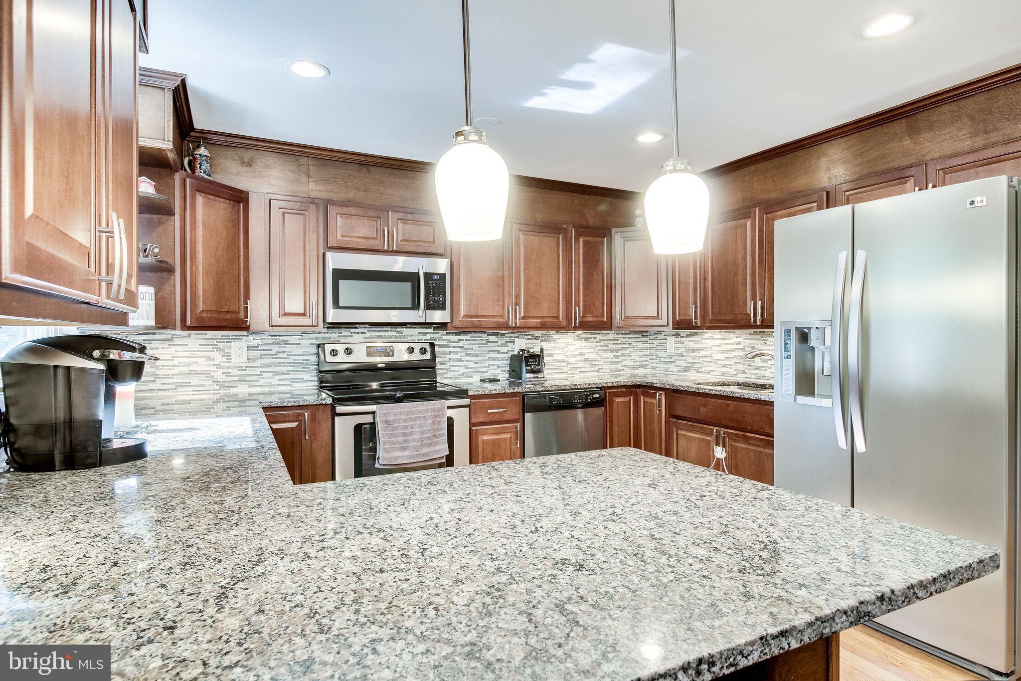 8180 Dark Den Circle Springfield, VA 22153 - Photo 2 of 30 This 4 year young kitchen sparkles!