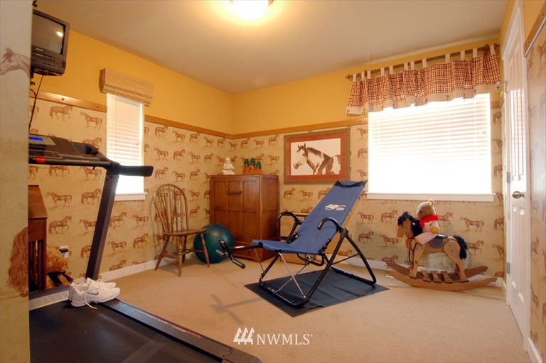 25527 Southeast 275th Place Maple Valley, WA 98038 - Photo 14 of 20 a view of a room with gym equipment