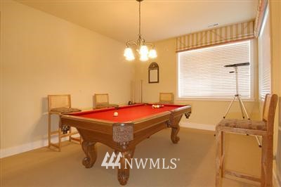 25527 Southeast 275th Place Maple Valley, WA 98038 - Photo 4 of 20 a room with pool table and windows