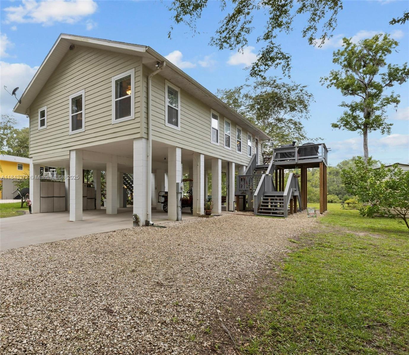 2159 Northwest 82nd Terrace Bell, FL 32619 - Photo 14 of 48 front view of a house with a yard