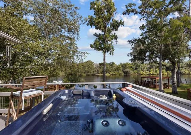 a view of city from balcony with seating space