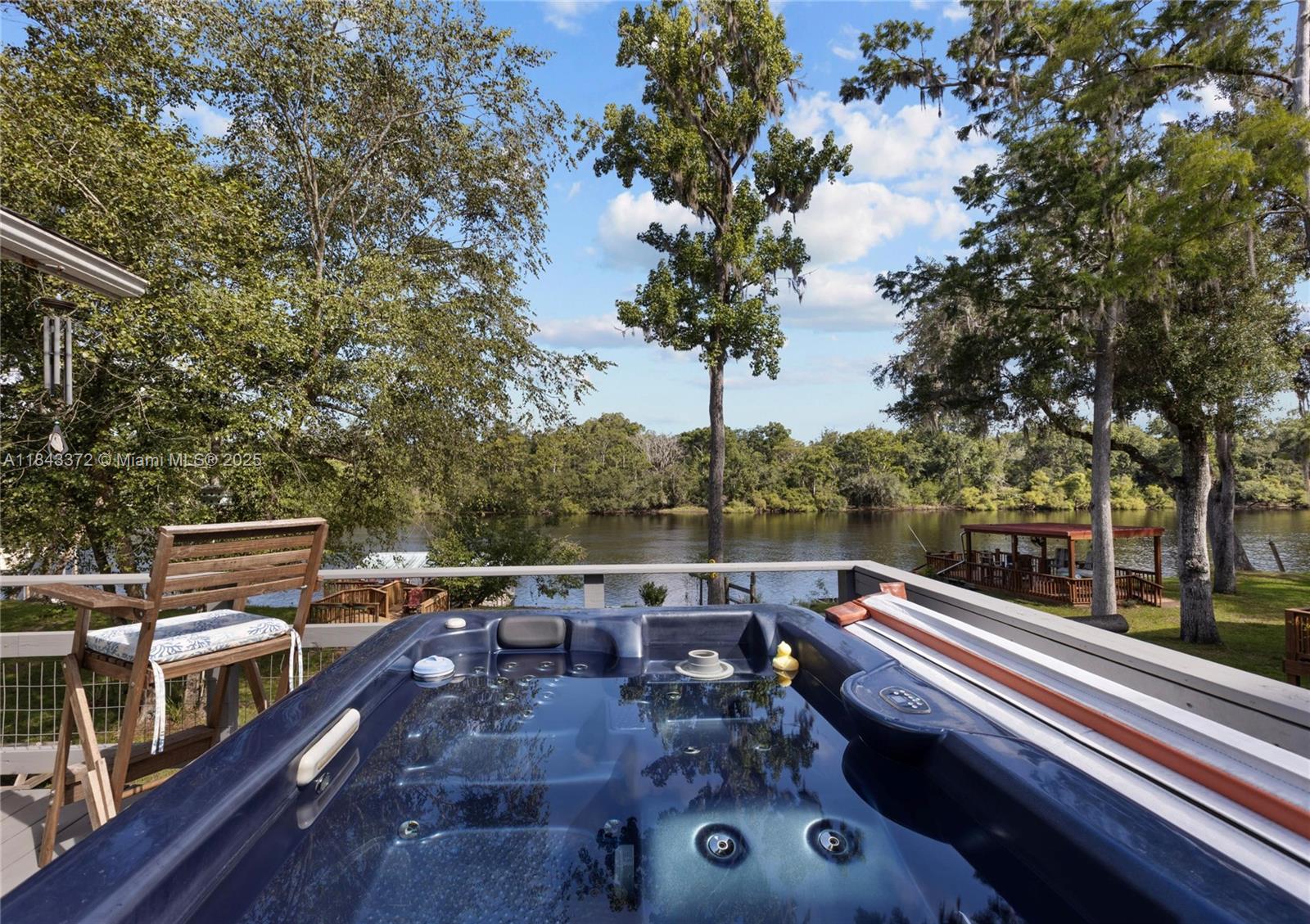 2159 Northwest 82nd Terrace Bell, FL 32619 - Photo 26 of 48 a view of city from balcony with seating space