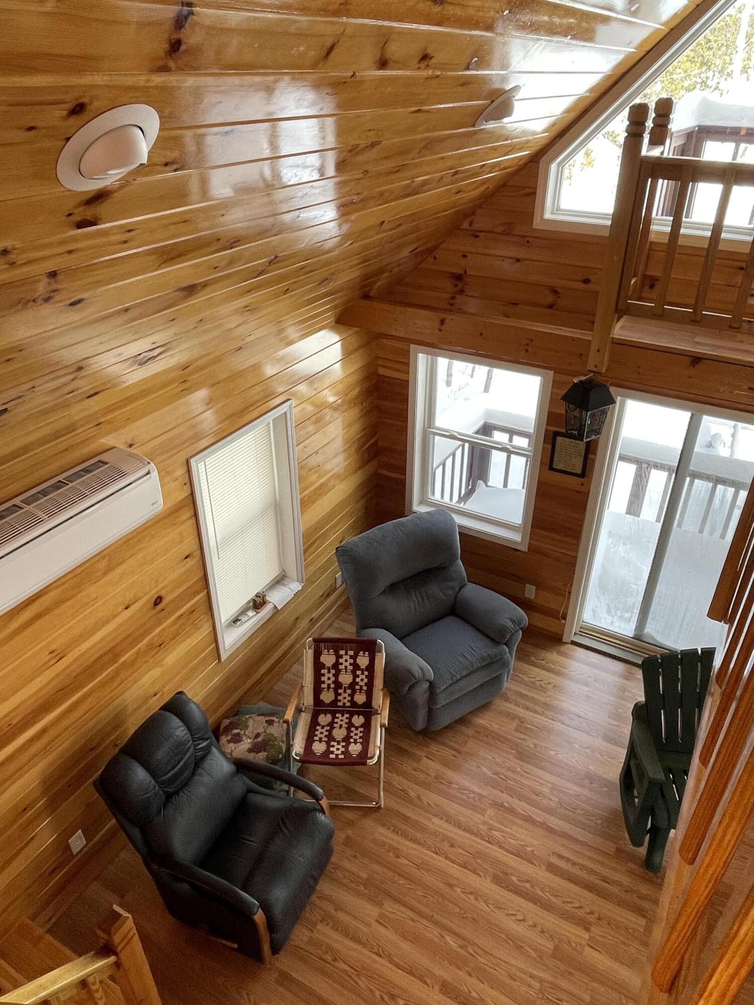 234 W Road Portage Lake, ME 04768 - Photo 22 of 27 livingroom view from upstairs