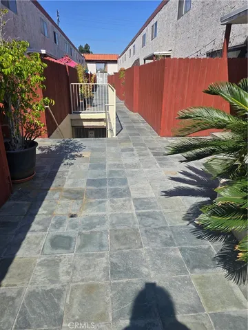 a view of a backyard with sitting area