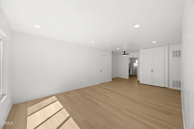 an empty room with a natural light