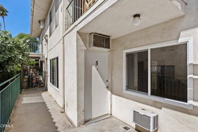 a view of a house with entryway and stairs