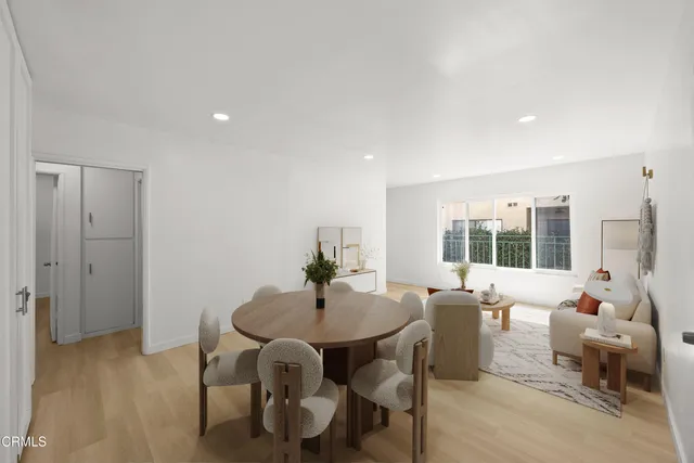 a view of a dining room with furniture window and outside view