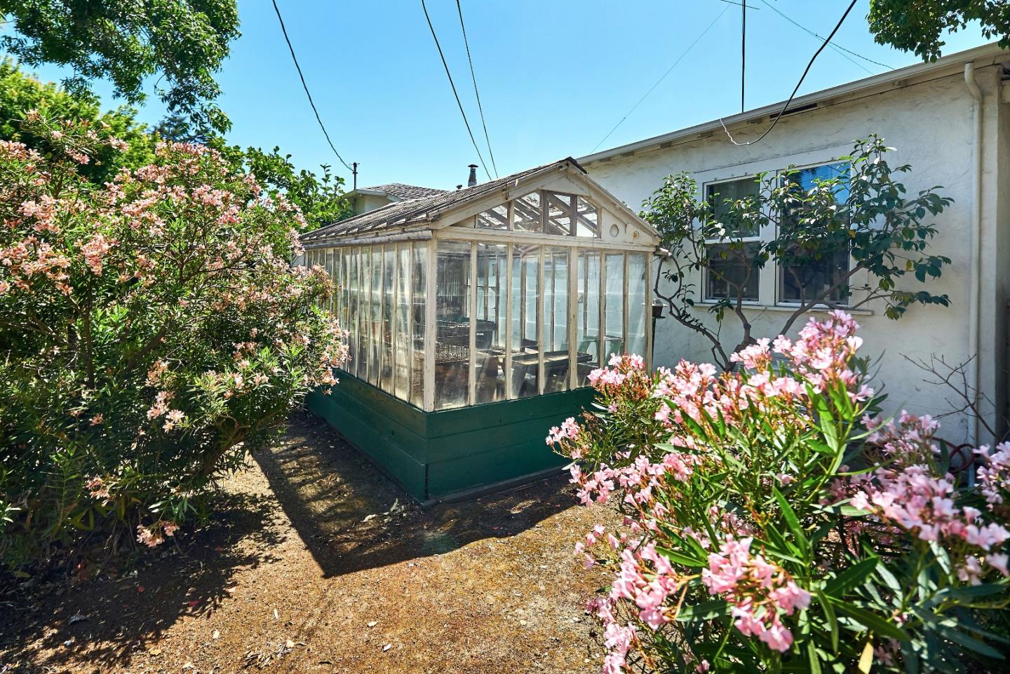 205 View Street Mountain View, CA 94041 - Photo 23 of 30 a front view of a house having yard