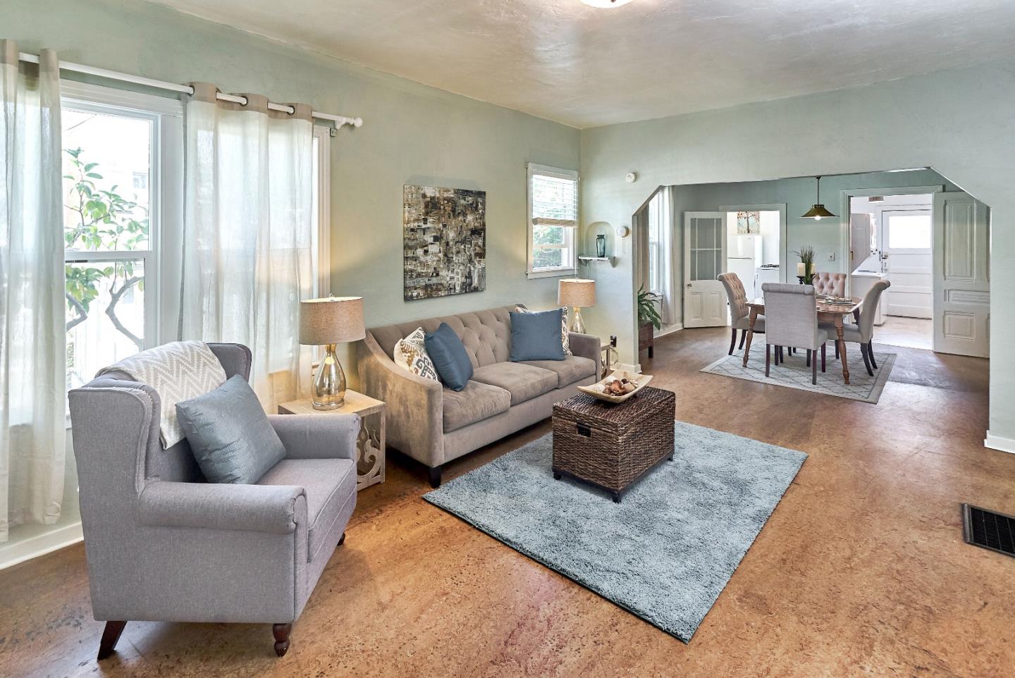 205 View Street Mountain View, CA 94041 - Photo 6 of 30 a living room with furniture and a large window