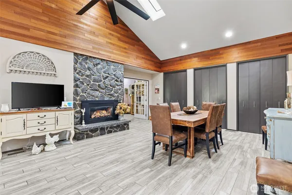 a view of a livingroom with furniture and a fireplace