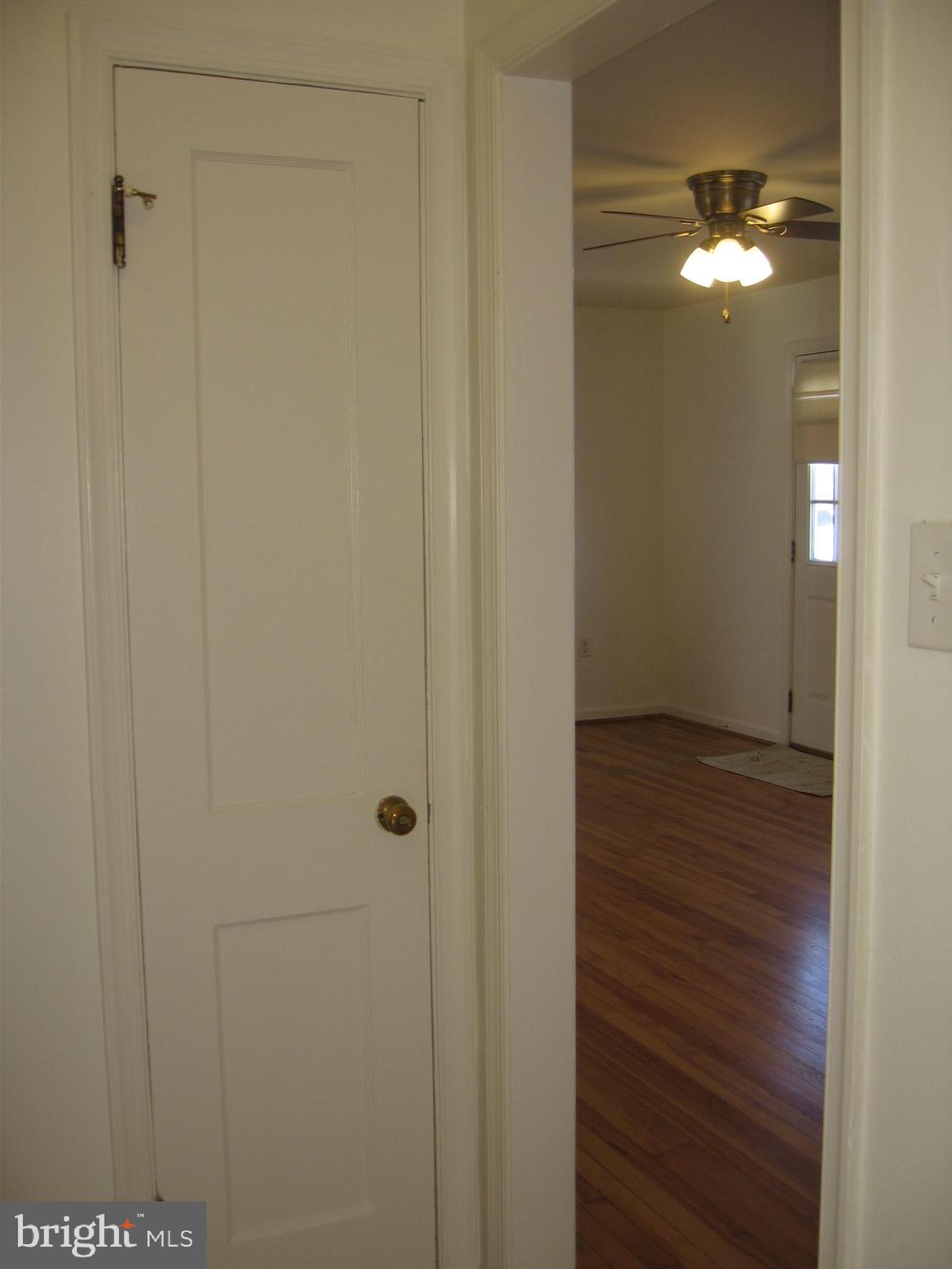 121 West 7th Avenue Ranson, WV 25438 - Photo 7 of 16 Areaway between Bedrooms/Bathroom and Living Room