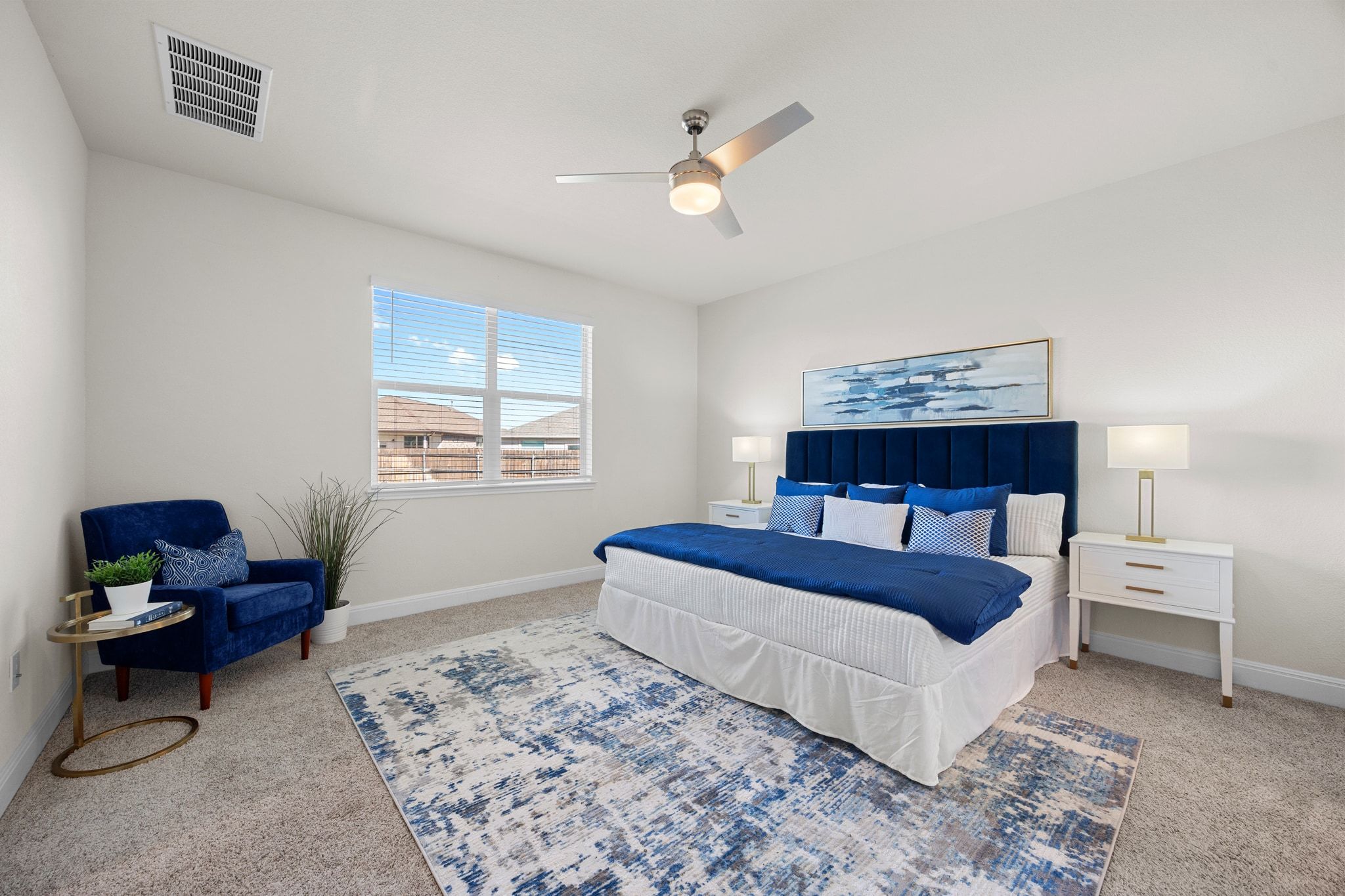 16804 Guido Cove Pflugerville, TX 78660 - Photo 13 of 38 Carpeted bedroom featuring ceiling fan and baseboards