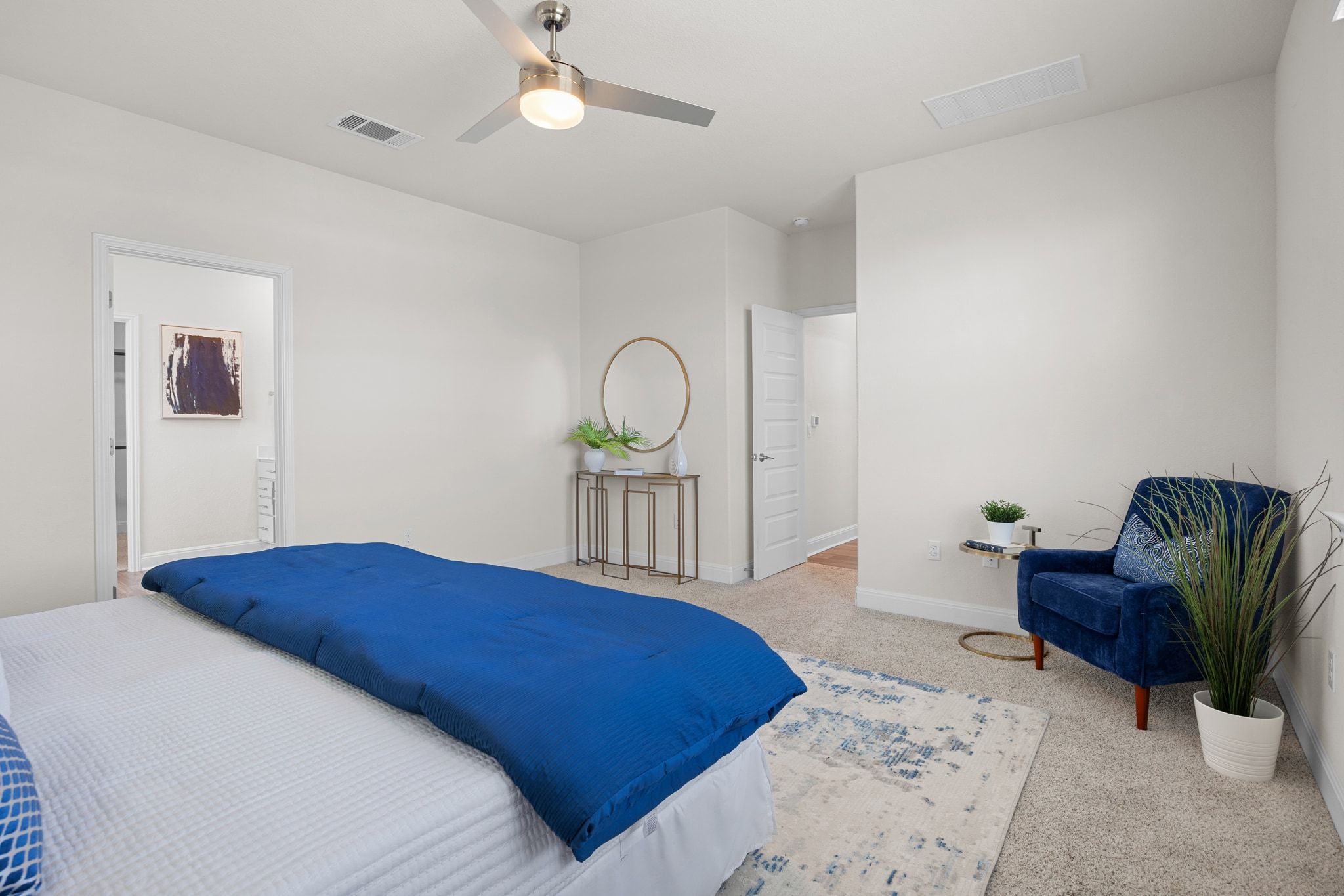 16804 Guido Cove Pflugerville, TX 78660 - Photo 14 of 38 Carpeted bedroom featuring ceiling fan and baseboards