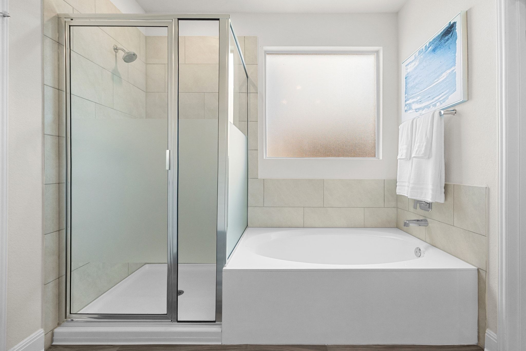 16804 Guido Cove Pflugerville, TX 78660 - Photo 16 of 38 Full bath featuring a shower stall and a bath