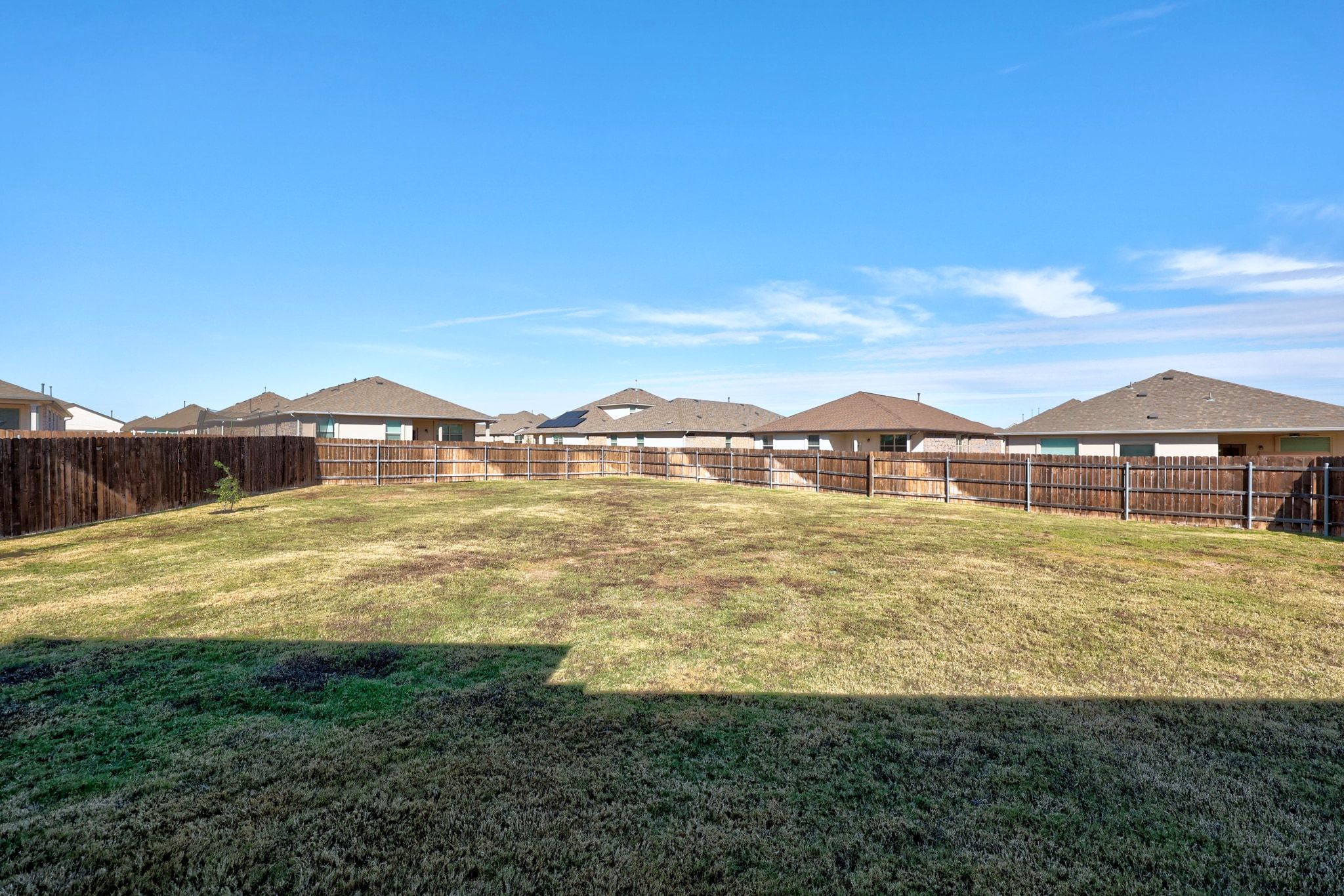 16804 Guido Cove Pflugerville, TX 78660 - Photo 29 of 38 Fenced backyard featuring a residential view