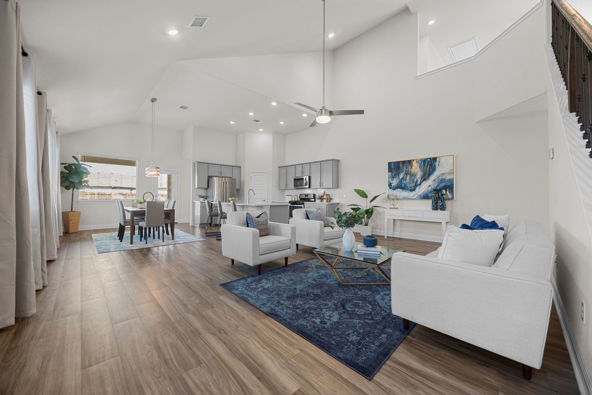 16804 Guido Cove Pflugerville, TX 78660 - Photo 4 of 38 Living area featuring ceiling fan, high vaulted ceiling, dark wood-type flooring, and recessed lighting