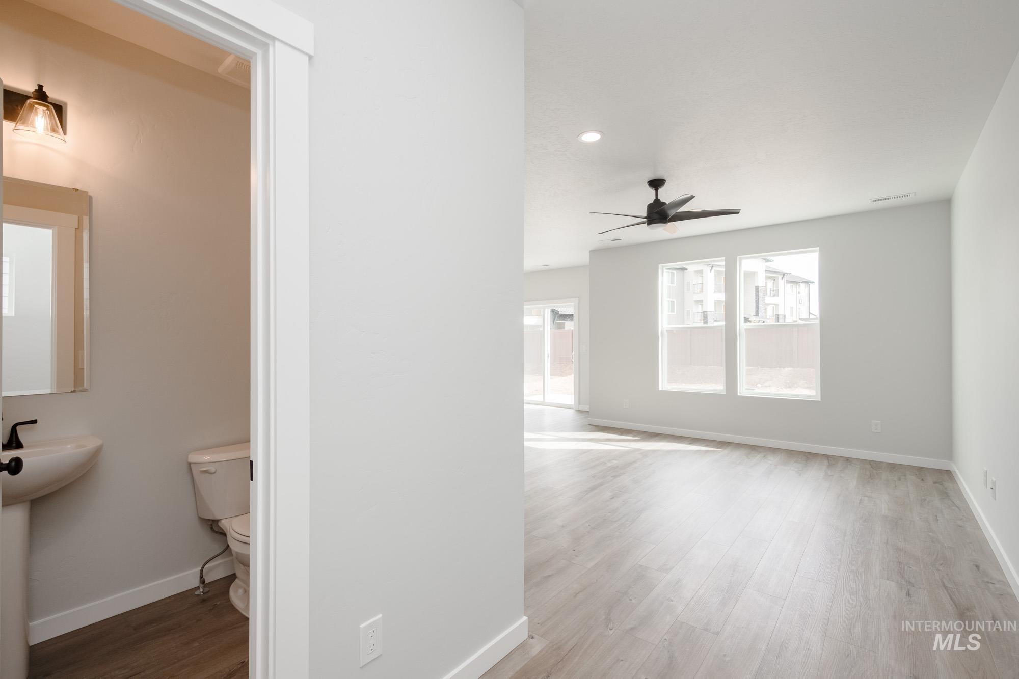 2192 South Border Way Meridian, ID 83642 - Photo 11 of 22 Bathroom with wood finished floors, ceiling fan, and recessed lighting