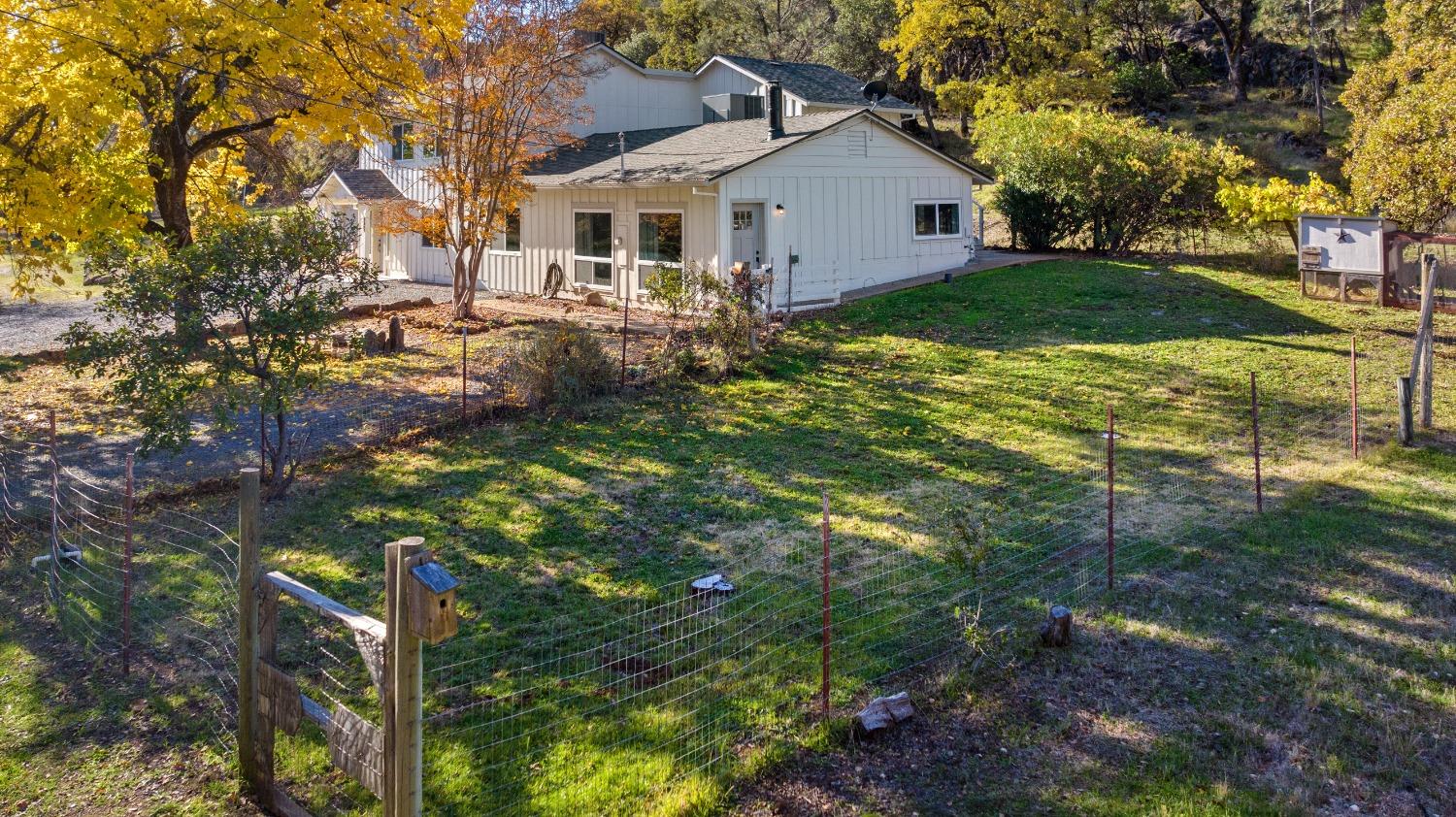 16153 Indian Springs Road Penn Valley, CA 95946 - Photo 12 of 64 a front view of house with yard and green space