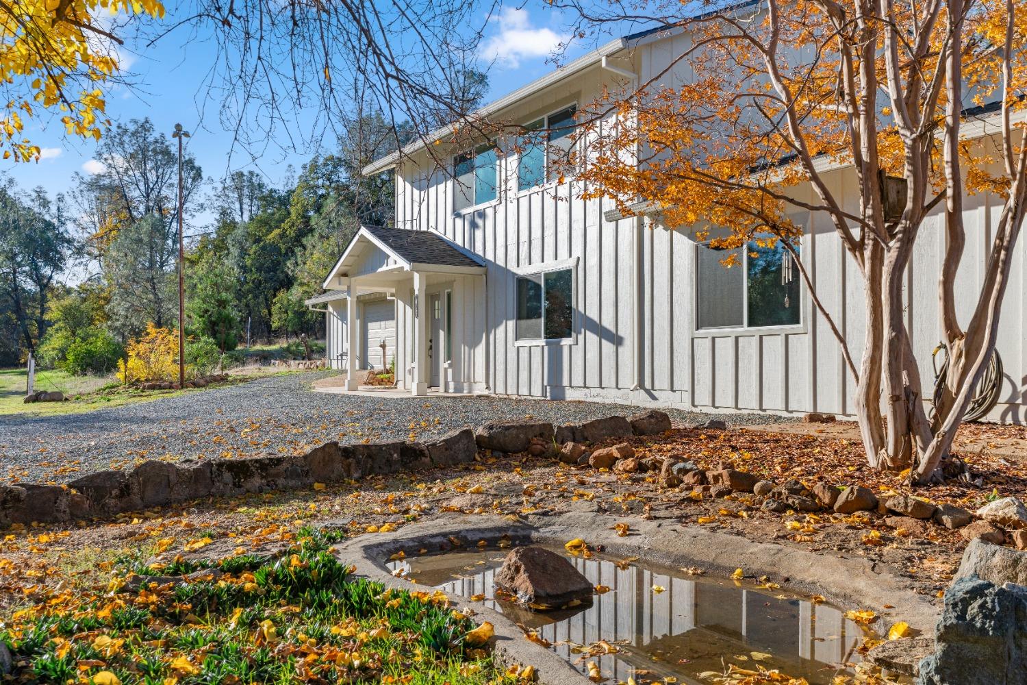 16153 Indian Springs Road Penn Valley, CA 95946 - Photo 2 of 64 a view of a house with a yard