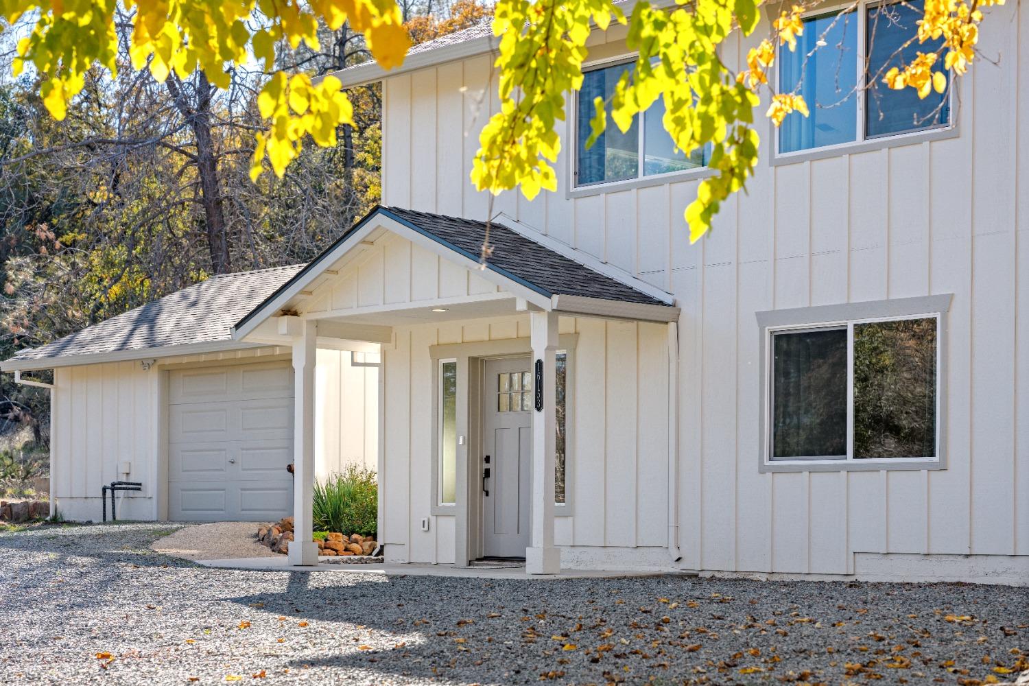 16153 Indian Springs Road Penn Valley, CA 95946 - Photo 3 of 64 a front view of a house with a garden