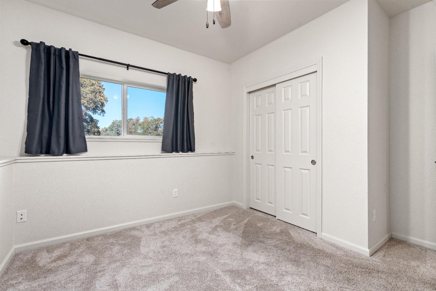 16153 Indian Springs Road Penn Valley, CA 95946 - Photo 59 of 64 a view of an empty room with a window