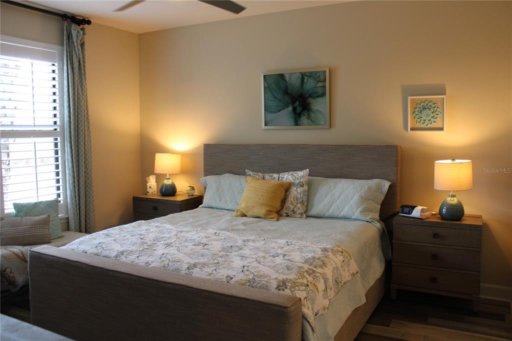 13711 Messina Loop, Unit 104 Bradenton, FL 34211 - Photo 15 of 70 a bedroom with a bed and a window